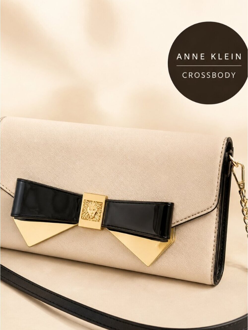 Anne Klein | Women's | Cream Crossbody - Black Patent Bow & Gold Lion Logo